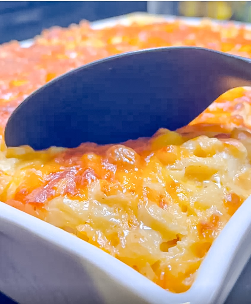 a dish full of old fashioned baked macaroni and cheese