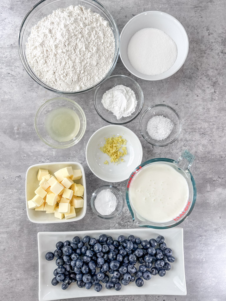 All pre-measured ingredients for the lemon blueberry biscuits being displayed on the counter.