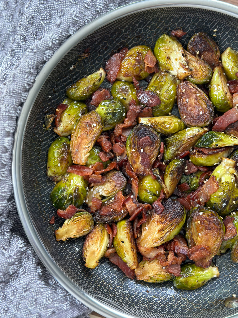 Brussel Sprouts with Bacon and Balsamic Glaze in a serving platter.