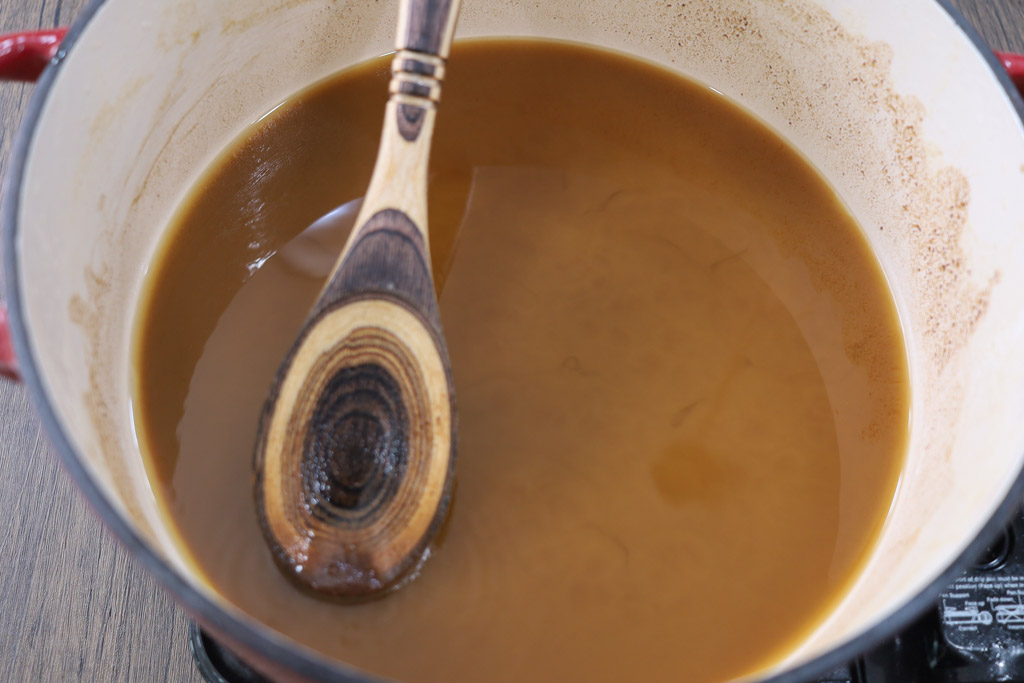 Creating the dark roux in a dutch oven.